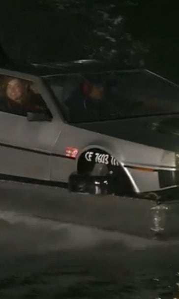 DeLorean hovercraft cruises through McCovey Cove during Giants game